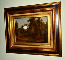 Hübsche kleine Bilderuhr mit