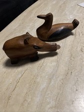 2 Tiere aus Holz . Handgefertigt. Ente und Nielpferd