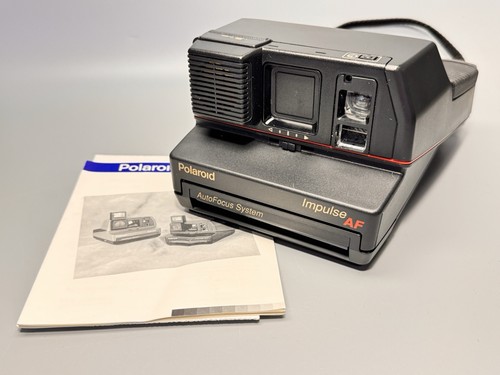 Polaroid impulse auto - auto, focus