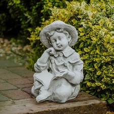 Junge mit Buch Kinderfigur