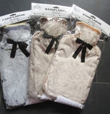 Wärmflasche mit Fellüberzug