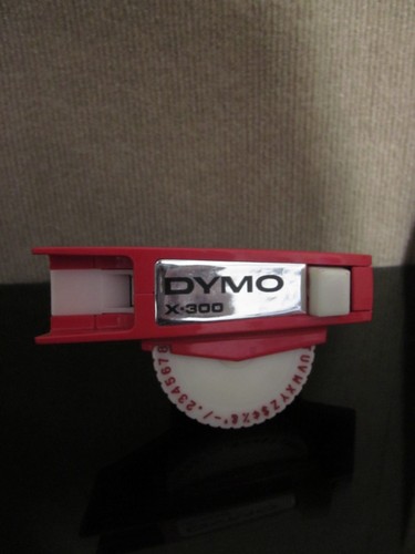 Dymo label maker red - label,