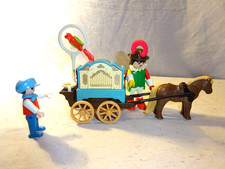 Playmobil Clown an der Drehorgel.  Die Drehorgel hat Musik Funktion