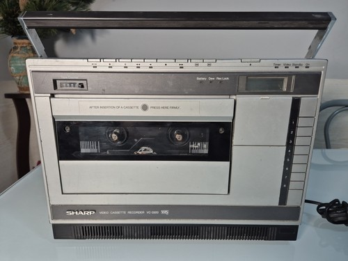 Sharp video cassette recorder - video,