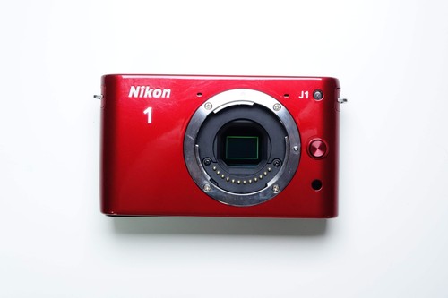 Nikon mirrorless red body - j1,