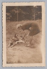 Woman Showing German Shepherd