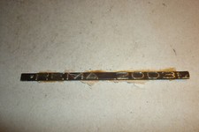 Schönes altes Radio - Fernseher Emblem Rema 2003 goldauf Schwarz - Schriftzug !