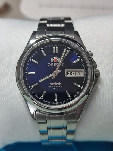 Orient three star tri - three, star/tri‑star