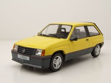 Opel Corsa A SR 1983 gelb Modellauto 1:18 MCG