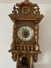 Freischwinger Wanduhr