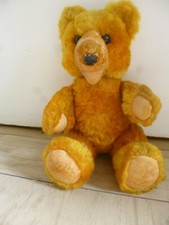 Alter gelb/oranger Teddy Bär
