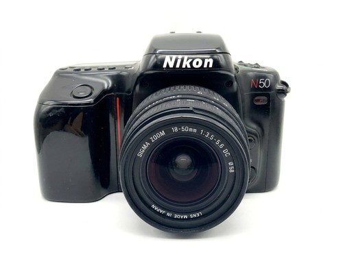 Nikon n50 sigma - +,