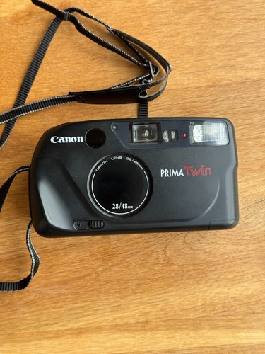 Canon prima twin point shoot - canon,