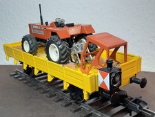 Märklin Maxi Spur1 Niederbordwagen mit Schlusslicht und Ladegut "Fiat Traktor"