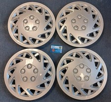 4 gebrauchte Universal Radkappen in 13 Zoll Retro 90er Jahre