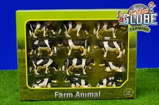 Kids Globe Kühe schwarz/weiß 12 Stück liegend / stehend / fressend, Maße 6x10 cm