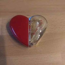 Parfümflasche  in herzform