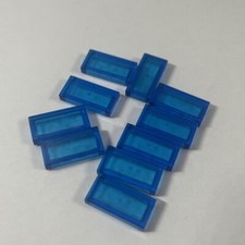 10x Lego Fliese 1x2 trans dark