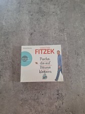 Fische, die auf Bäume