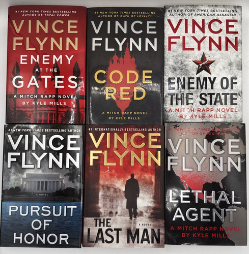 Lot books by vince - lot,