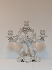 3-fl. Leuchter mit 2 Putten