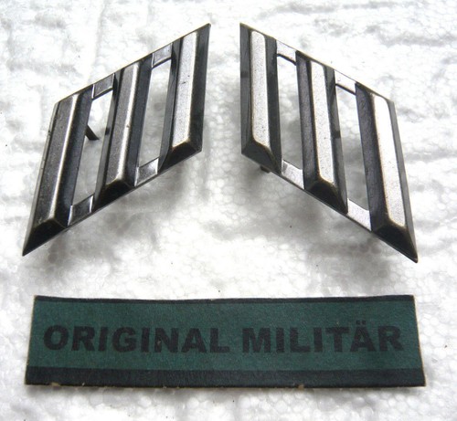 Paar metall auflagen - 3,