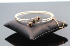 ANTIKER ARMREIF MIT GRANAT UND