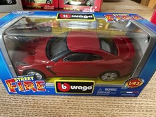 Nissan GT-R 1:43 Bburago Street Fire Skyline Modellauto in Box