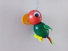 Papagei mit Schwingfeder aus