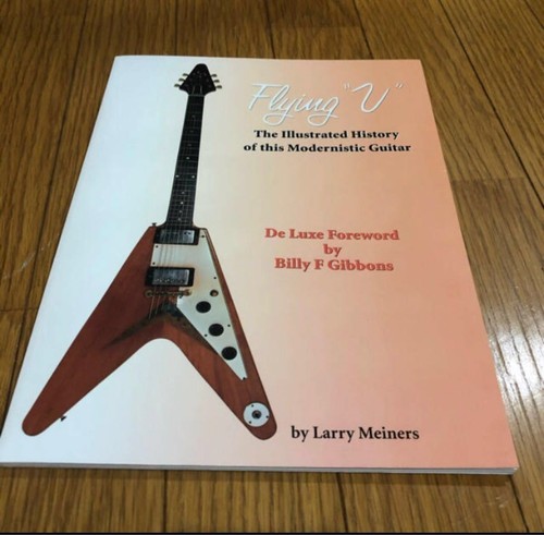 Flying guitar history book - flying,