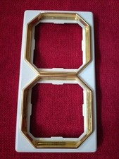 Merten Octocolor Cremeweiß 2-fach Rahmen mit Farbringen in gold