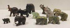 Konvolut 12 verschiedene Elefanten Figuren 6x Stein, 5x Holzetc. 1x Gießware