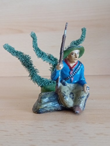 Masse cowboy sitzend gewehr - cowboy,