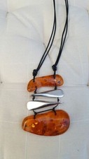Ostseeschmuck Bernsteinkette 925ér Silber poliert Leder ausgefallenes Design 