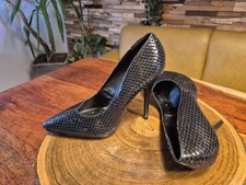 Elegante schwarze high - high, heels