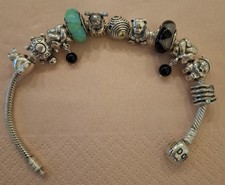 Pandora Armband mit 11 Charms*