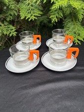 4 Teegläser orangefarbigen Kunststoffgriff Teeuntersetzer Porzellan Silberrand