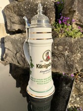 2 Bierkrüge mit Zinndeckel