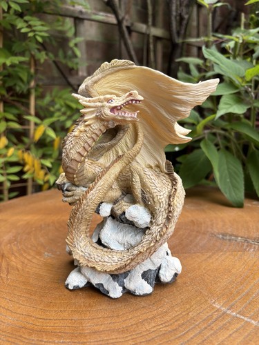 Tutor mint land the - of, dragons
