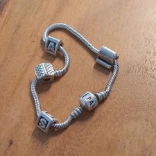 Pandora Armband  mit 4 Charm Elementen 20 cm, 29g Silber 925