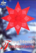 Leuchtende Fenstersterne aus