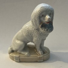Porzellanfigur puffhund - porzellanfigur,