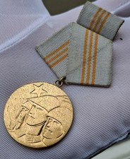 DDR Orden Waffenbrüderschaft 1. Stufe Gold mit Band und Spange