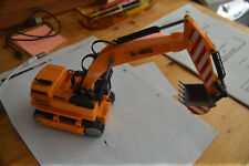 Baggerfahrzeug mit Gleisketten, Schwungantrieb, Schaufel beweglich