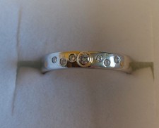 Platinring mit Gelbgold und 7 Diamanten