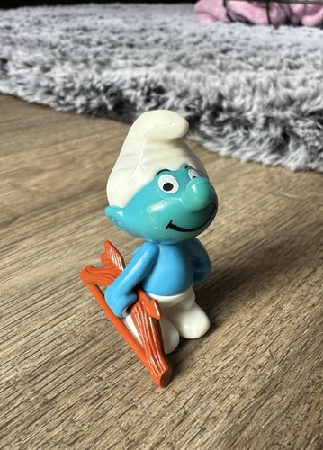 Steckfigur schlumpf mit pfeil - mit,