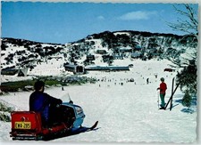 10274027 - Smiggin Holes Car Park and Smiggins Hotel Winter Schneescooter