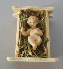 Jesuskind 3 cm lang mit Holz