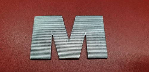 Buchstabe rechts für - "m",