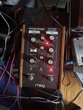Moogerfooger Delay MF-104M (MIDI-Version) with a custom power supply.